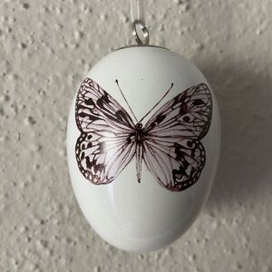 White ceramic Egg Ornament with Butterfly Design